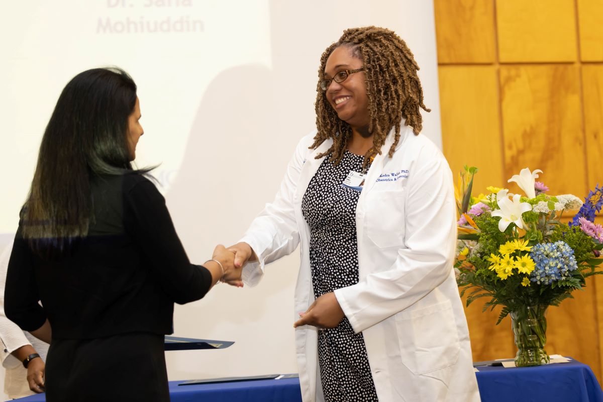 Student accepting an award at the 2023 Honors and Awards Ceremony